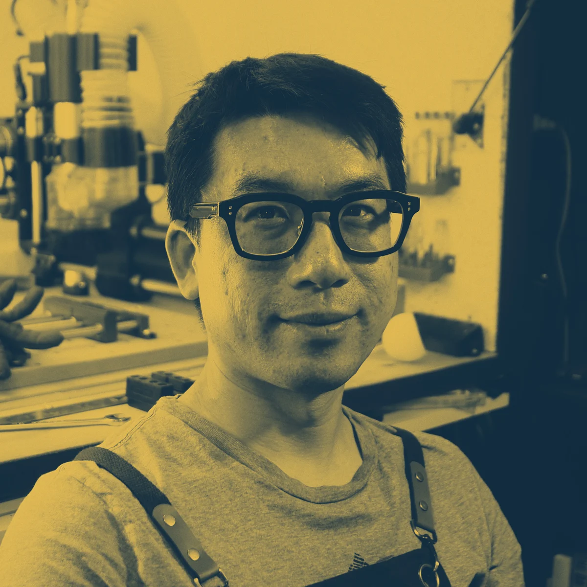 Andy Tsang in his Toronto workshop beside the CNC machine